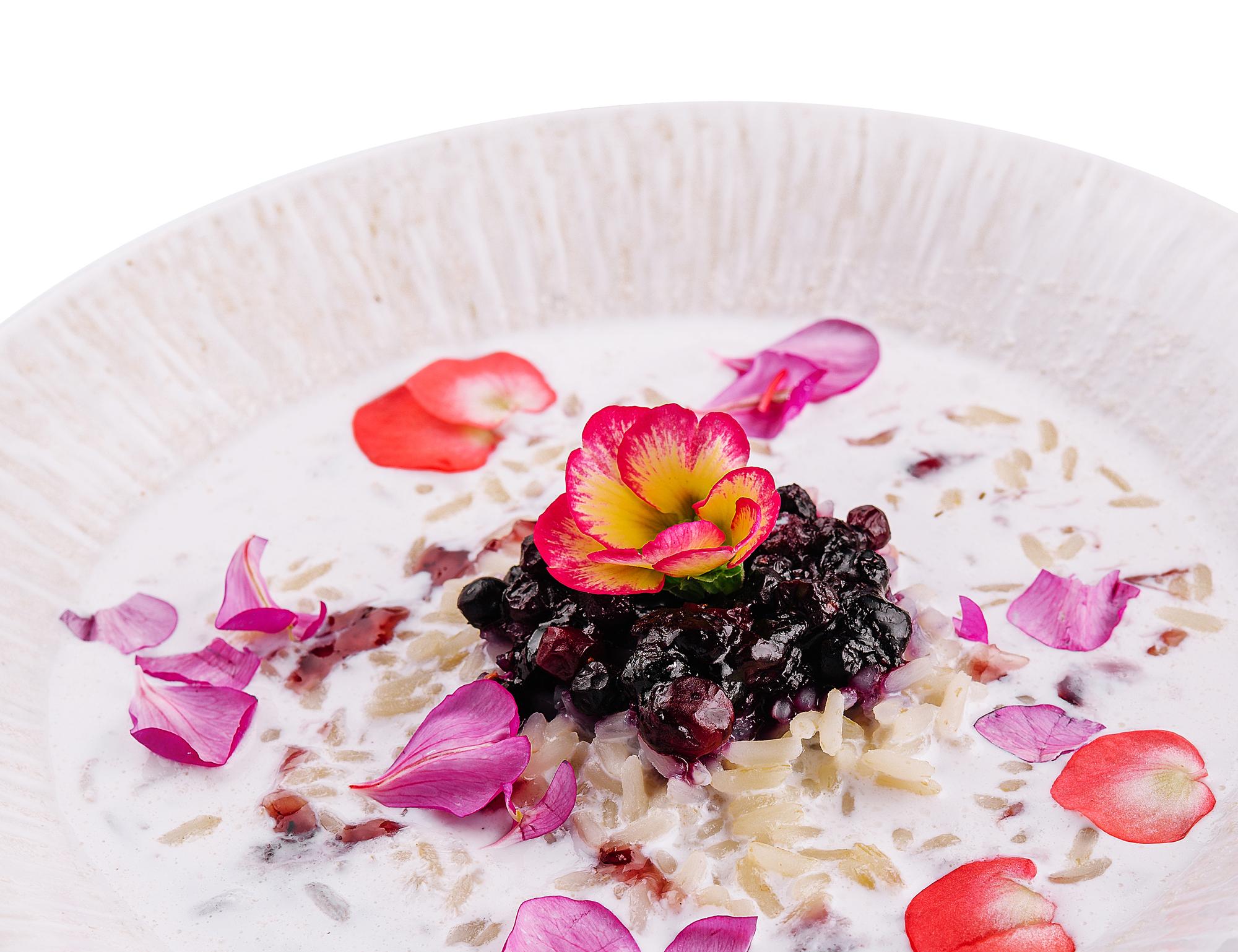 Plated dessert with edible flowers