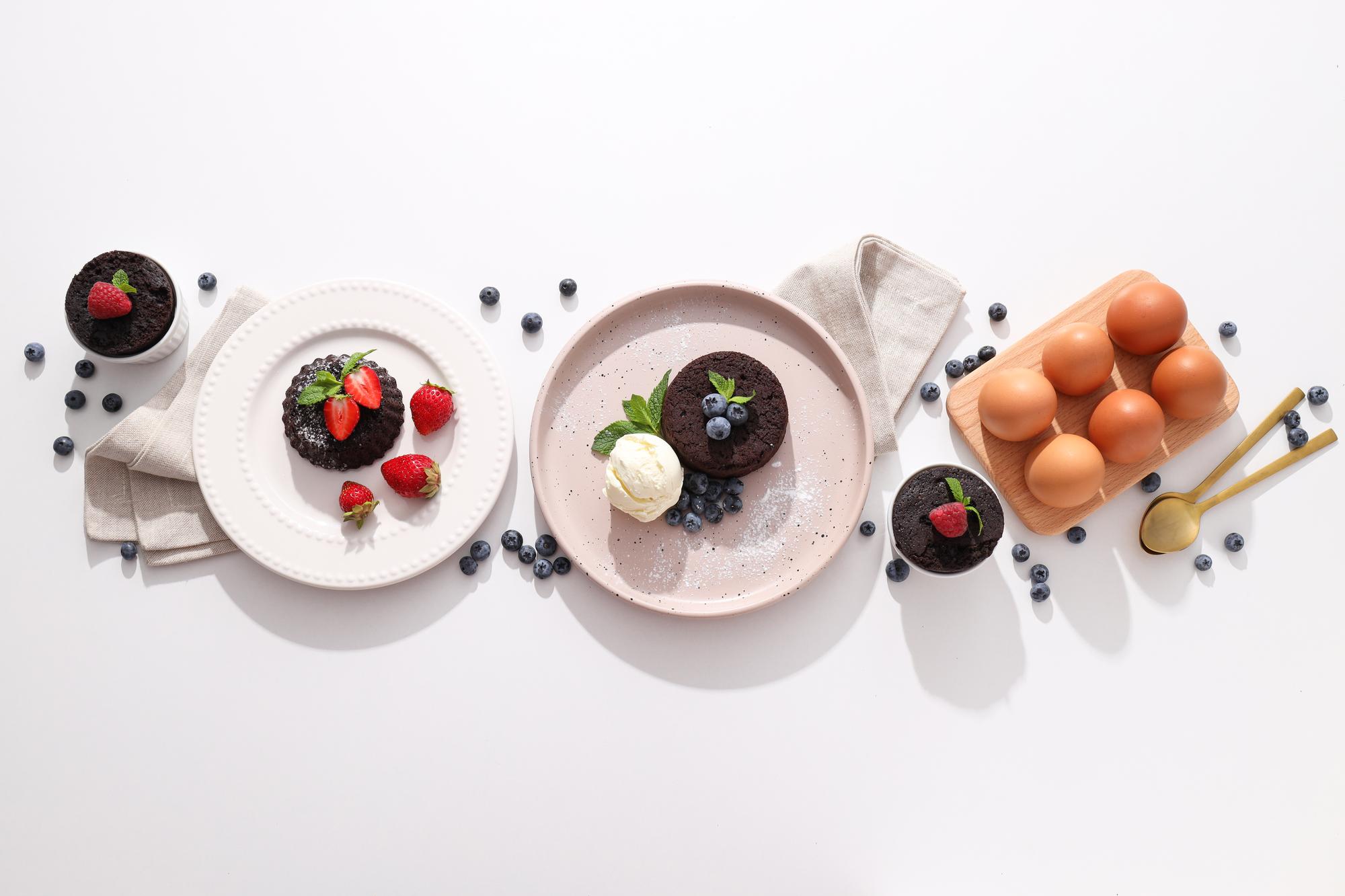 Assorted plated courses on wooden table